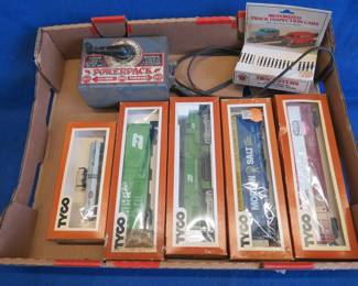 Lot 221. Tyco HO Scale Burlington Northern Engine, Four Tyco HO Cars, and Train Transformer