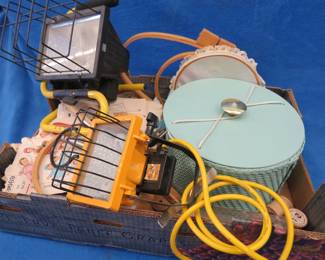 Lot 234. Sewing patterns, other sewing items, and floodlights