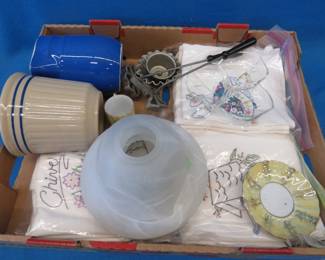 Lot 241. Fancy dish towels, rosette molds, and more
