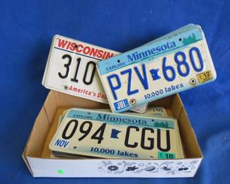 Lot 244. Minnesota and Wisconsin License Plates