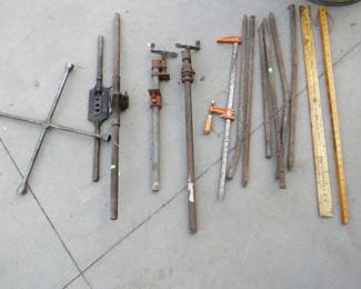 Lot 255. Pipe Clamps, Yard Sticks, Bench Clamp, And More