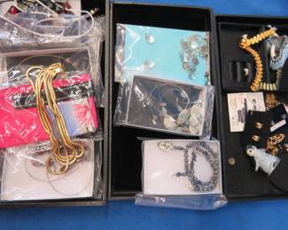 Lot 273. Three trays of costume jewelry