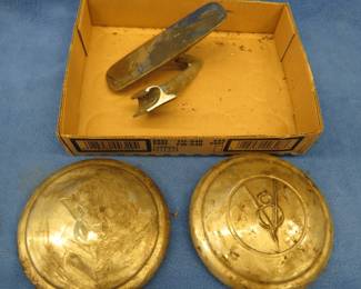 Lot 301. Vintage Ford Hubcaps and a mirror