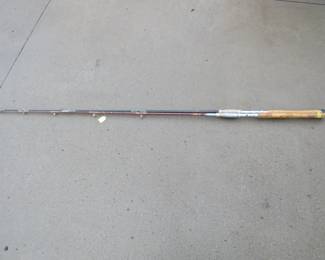 Lot 328. Two very stout 76" spin cast fishing rods.