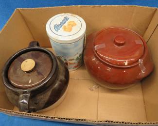 Lot 336. Two bean pots and two tins