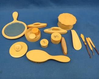 Lot 337. Vintage celluloid dresser set
