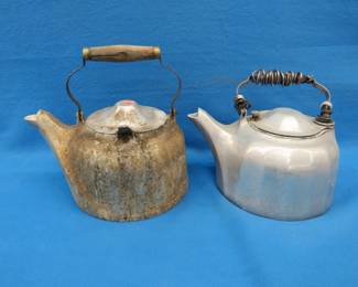 Lot 349. Wagner Ware and&nbsp; Griswold tea kettles