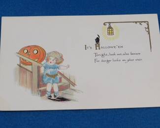 Lot 369. Vintage Pink Perfection Halloween postcard in excellent condition featuring&nbsp; a little girl, jack 'o lantern and black cat