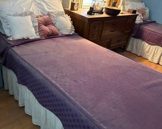 0ne of two twin beds