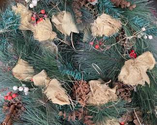 Five Christmas outdoor wreaths.