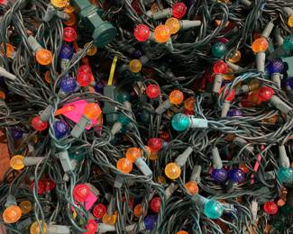 Boxes of bound strands of LED indoor/outdoor lighting. Mixed colors and single color.