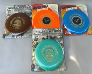 Group Of 4 Whamo SuperPro And World Class Frisbees
