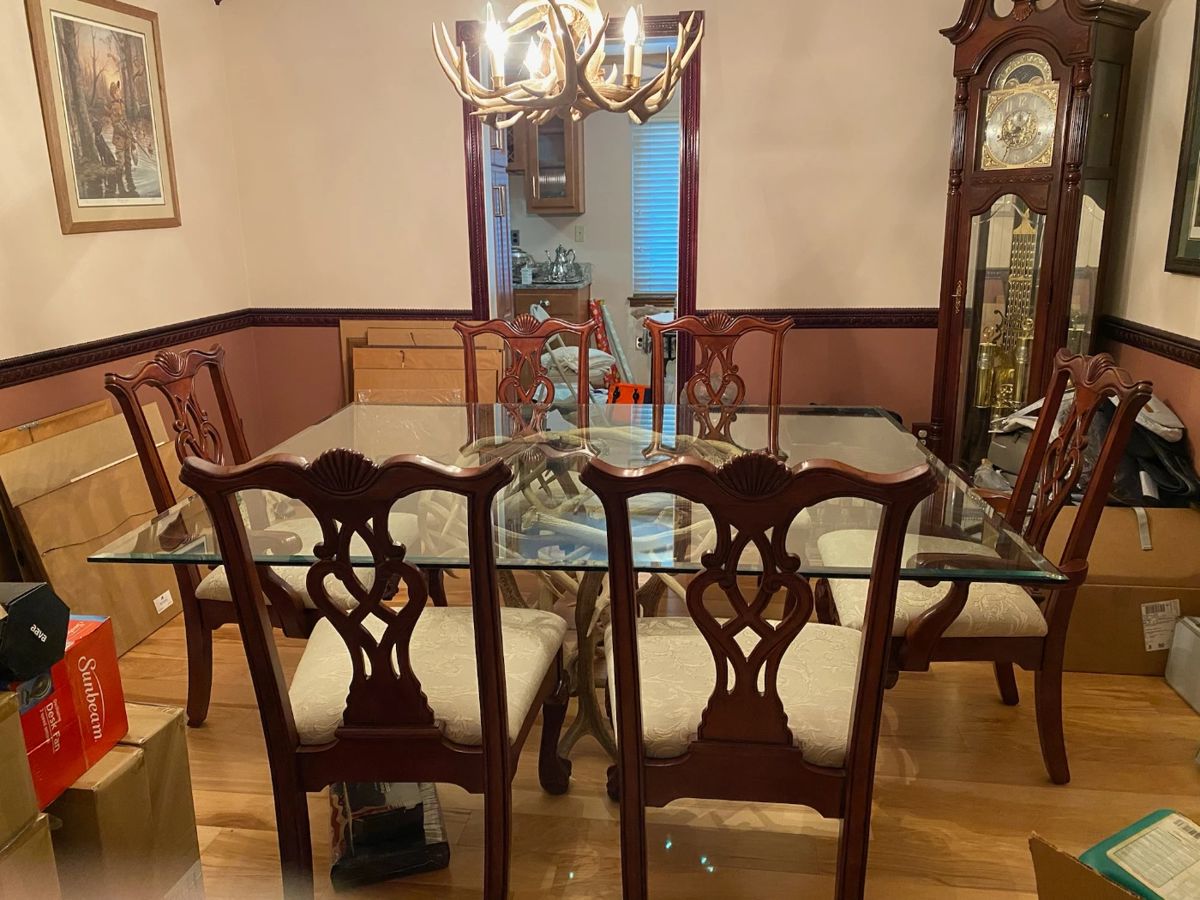 Genuine Elkhorn table with six chairs and extra round glass