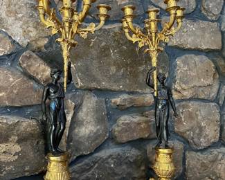 Beautiful 19 Century French Empire Gilt and Patinated Bronze candelabra raised on paw feet . Height 28" Diameter11"