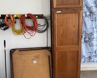 Cabinet, card table and electrical cords