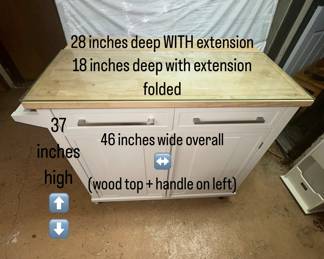 Custom cut tempered glass to prevent food absorption into wood. Easily lifts off if you wish. 