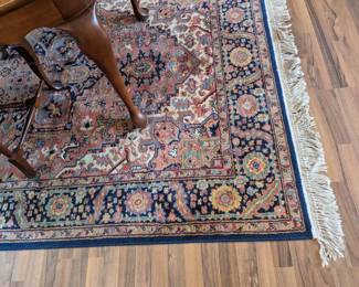 Several area rugs, and smaller matching rugs