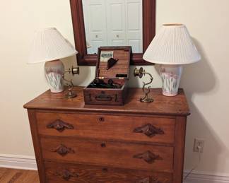 Antique device of some kind in box on dresser. I will check it out