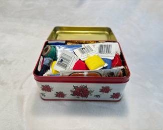 sewing supplies and tin