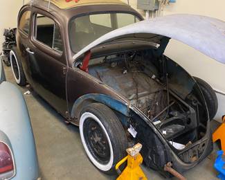 1963 Volkswagen ragtop beetle w/1600cc single port engine. Fenders included. W deck lid. New glass, new weather stripping, new airbag system and a powder coated air tank.
