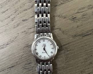 Ladies Omega  DeVille  stainless steel watch!!!
Gorgeous!!
There are over 50 men’s and women’s watches at the sale