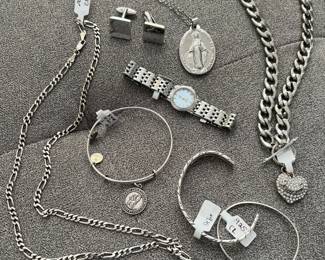 Many many pieces of sterling silver. More than you see in this picture.!