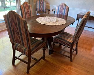 Jacobean upholstered chairs, antique round oak dining table with two leaves
