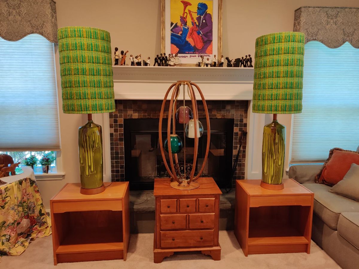 MCM at its BEST.  Pair of ceramic green lamps with original texture yarn shades.  3 Globe stunning wooden large table lamp.  Dansk end tables or Ethan Allen-your choice. Frankie Flores art in the background. 