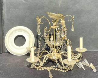 A Schonbek and Co brass chandelier