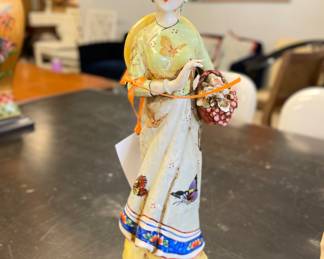 Porcelain Asian Figurine.