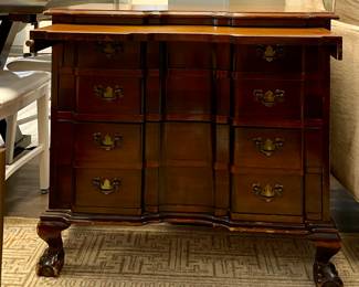 Small Mahogany Serpentine Front Side Table with Three Drawers, Pull Out Tray & Ball & Claw Feet. Measures 32.5" W x 18" D x 30" H. Great As Is But Would Be AMAZING Updated With A Fresh Coat Of Paint For A Modern Look & Feel. Photo 1 of 2.