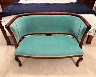 Art Deco custom kelly green velvet salon settee gifted to the family by Ivan Allen.
