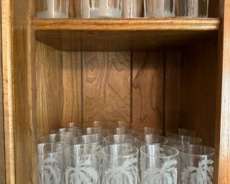two different sizes of these vintage “Palm Tree” etched glasses