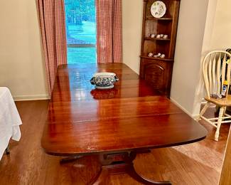 Drexel Thomas Cook Collection drop leaf lyre base table. Comes with three leaves plus custom pad set. Also marked “from Kornmeyers”.