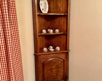 Very pretty corner cabinet….