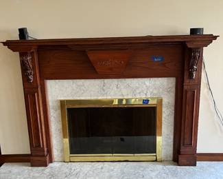 Fireplace mantle 79"x12"x55.75"  $500        Hearth stone $100                                                                                                       Glass doors $10