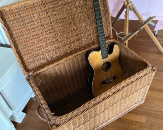 Wicker trunk $65. Acoustic guitar $100