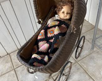 Doll carriage, blanket $50 ; Doll $12