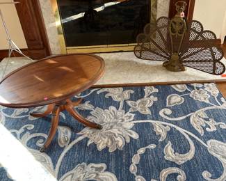 Table $125,  Rug $45, Fire Screen $200