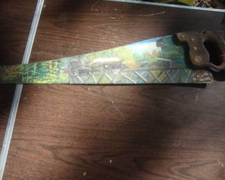 Hand saw with painted scene