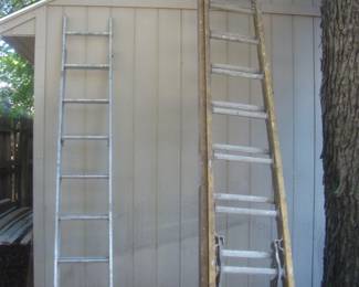 All American aluminum extension ladder, 16' (L), Werner 21' fiberglass and aluminum ladder (R)