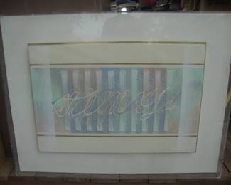 Signed art in plexiglass case