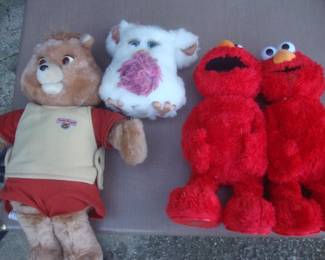 1985 Teddy Ruxpin, Large Furby, Tickle Me Elmo