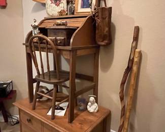 Child’s desk and small dresser.