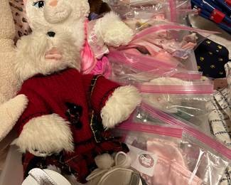 Various build a bears with clothes and stroller