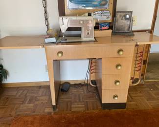 Singer sewing machine and mid century sewing desk 