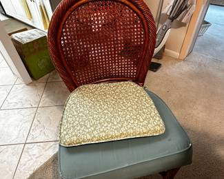 6 wicker dining chairs, 2 with arms and 4 without. Matches a beautiful glass top table, 