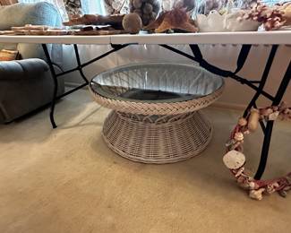 Large round wicker coffee table with glass top