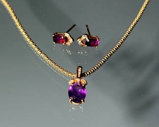 (3PC) AMETHYST, DIAMOND, & 14K GOLD DEMI PARURE | Including a pendant with central oval mixed cut amethyst (10.7 x 8.1 x 4.7 mm) suspended from a ropework necklace (necklace 18 in., 6.9g together); plus a pair of matching rectangular mixed cut diamonds - total weight 8.6g