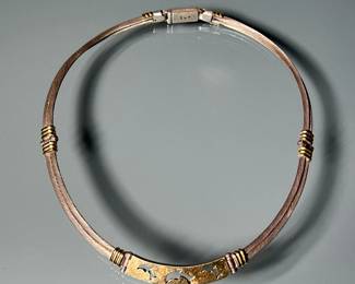 18K GOLD & STERLING SILVER DOLPHIN NECKLACE | marked "950 / K18 / (omega) W - " approximately 16 in. 64.8g